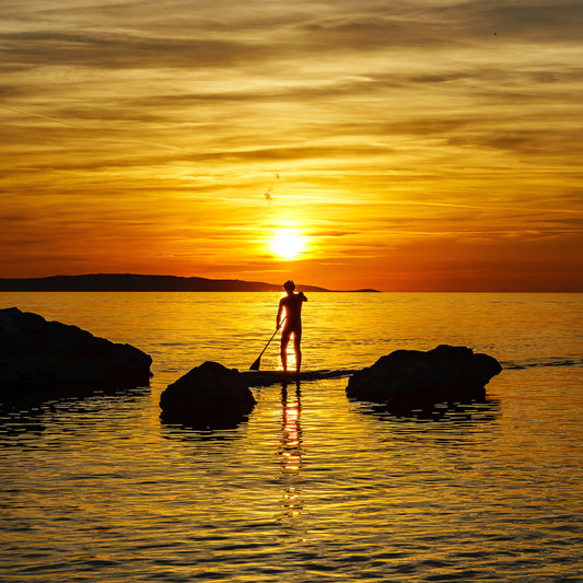 Padling i solnedgang på Åletjern